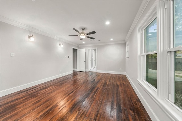 empty room featuring crown molding, ceiling fan, and dark hardwood / wood-style floors