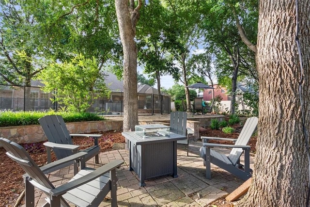 view of patio featuring an outdoor fire pit