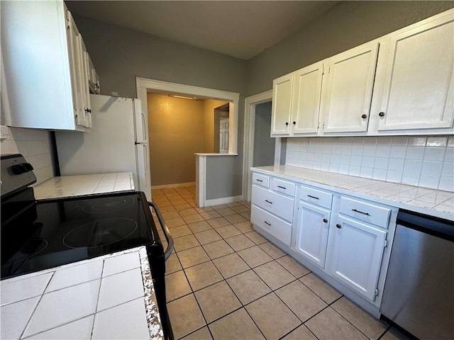 kitchen featuring black range with electric stovetop, white cabinetry, tasteful backsplash, and dishwasher