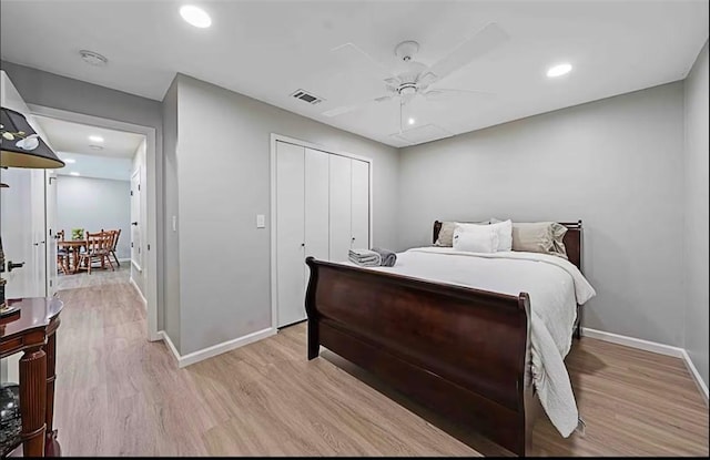 bedroom featuring visible vents, recessed lighting, light wood-style floors, and baseboards