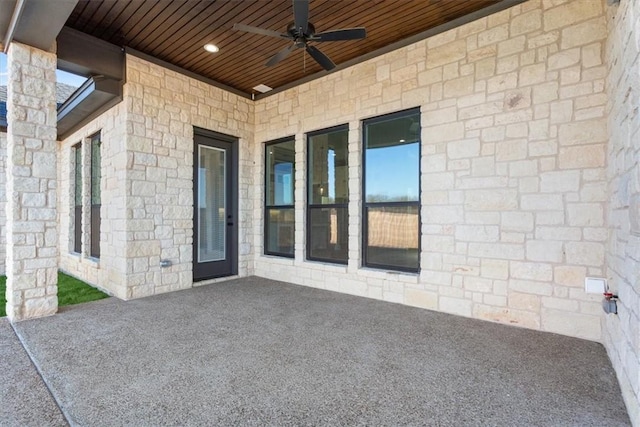 view of patio featuring ceiling fan