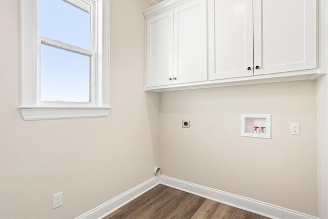 washroom featuring hookup for an electric dryer, cabinets, dark wood-type flooring, and washer hookup