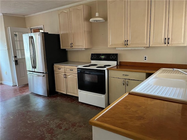 kitchen featuring hanging light fixtures, crown molding, white electric stove, cream cabinetry, and stainless steel refrigerator