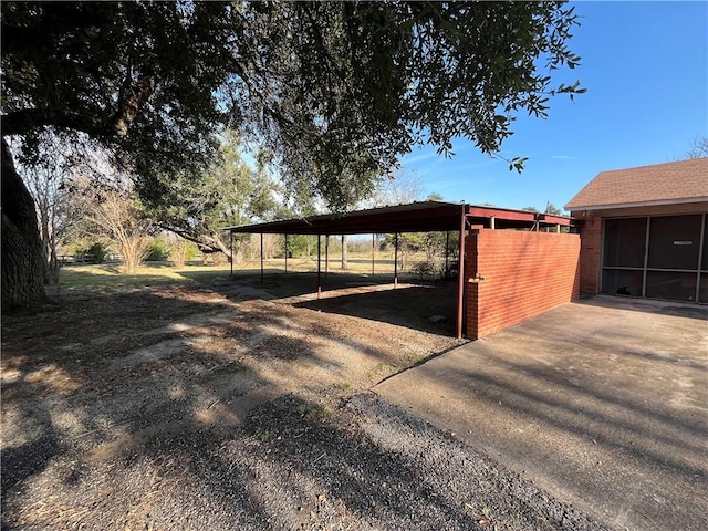 view of outdoor structure with a carport