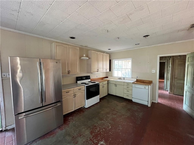 kitchen with white appliances, sink, and ornamental molding