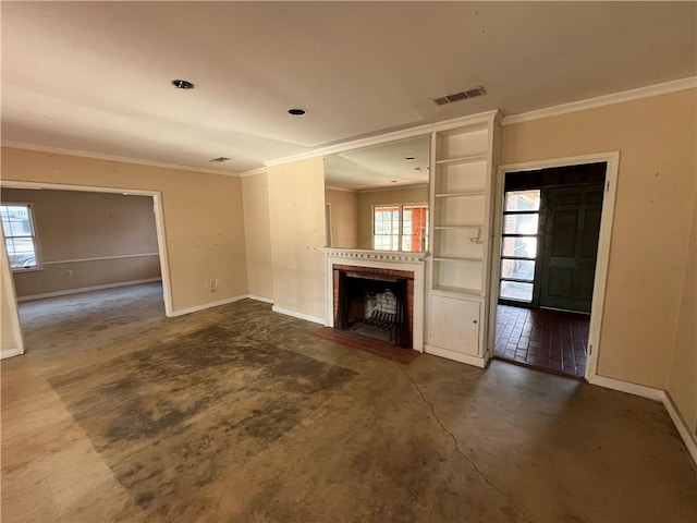 unfurnished living room featuring plenty of natural light and ornamental molding