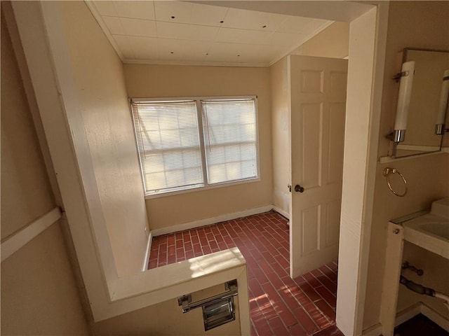 bathroom featuring ornamental molding