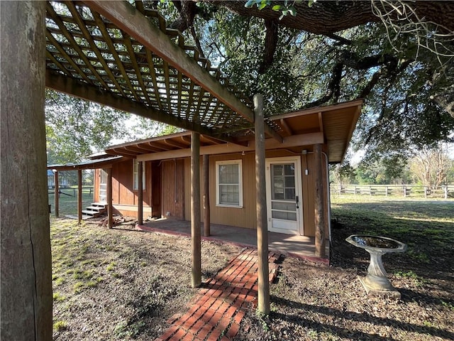 exterior space with a pergola