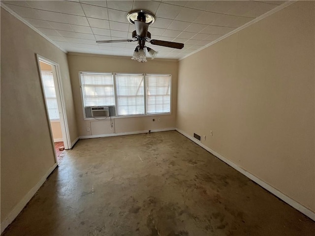 spare room featuring ceiling fan, cooling unit, and ornamental molding