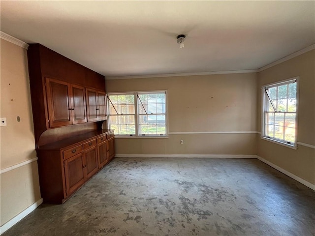 interior space with a wealth of natural light and ornamental molding