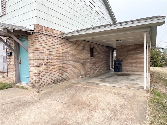 exterior space featuring a carport