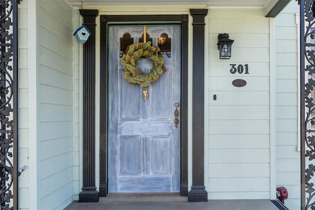 entrance to property with a porch