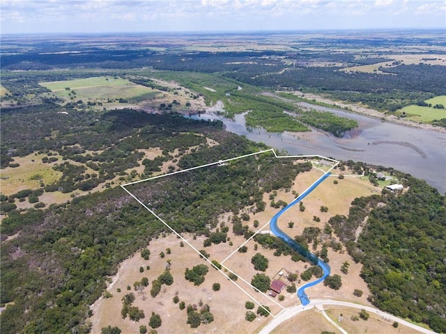 bird's eye view with a water view and a rural view