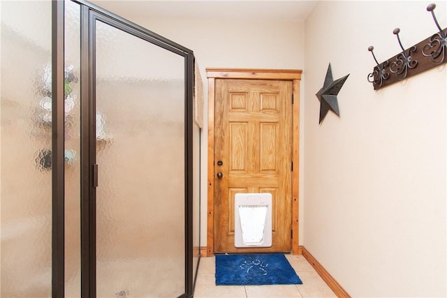 interior space featuring light tile patterned flooring