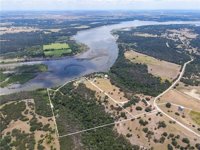 bird's eye view featuring a water view and a rural view