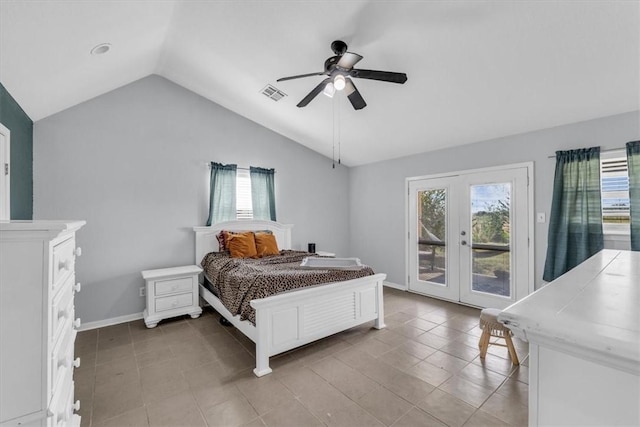 tiled bedroom with ceiling fan, lofted ceiling, access to outside, and french doors