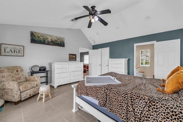 bedroom featuring tile patterned flooring, ceiling fan, and vaulted ceiling