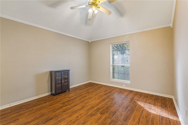 empty room featuring hardwood / wood-style flooring, ceiling fan, and crown molding