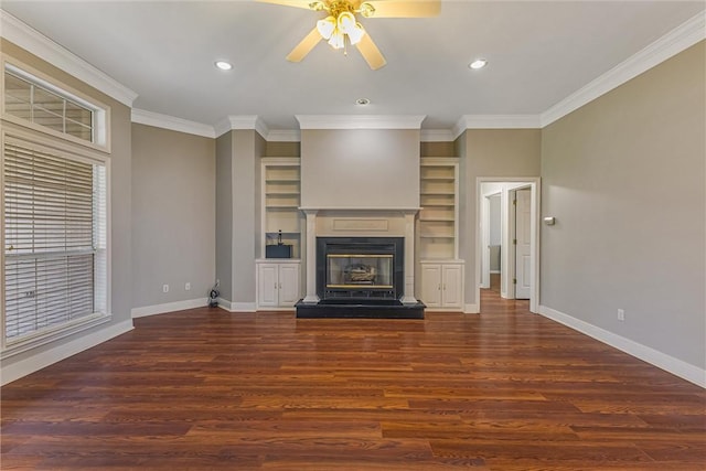 unfurnished living room with dark hardwood / wood-style flooring, ceiling fan, and crown molding