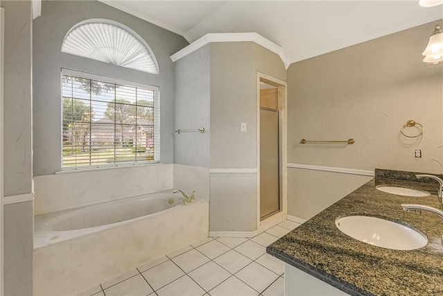 bathroom with separate shower and tub, tile patterned flooring, vanity, and lofted ceiling