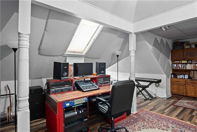 office area featuring hardwood / wood-style floors and vaulted ceiling