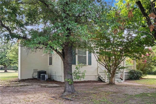 view of property exterior featuring central AC unit