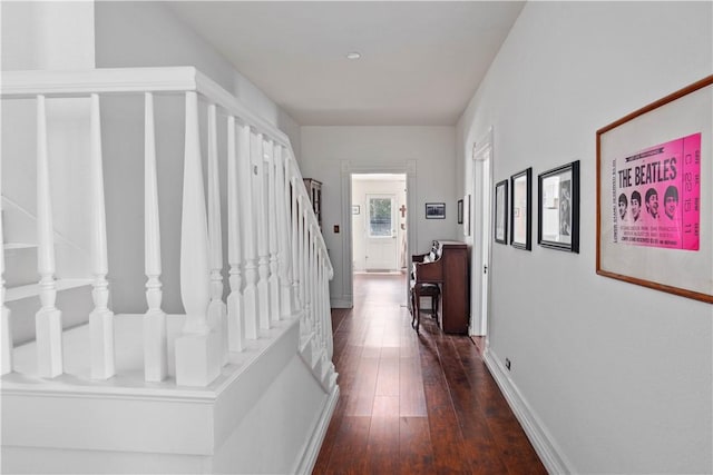 hall with dark hardwood / wood-style floors