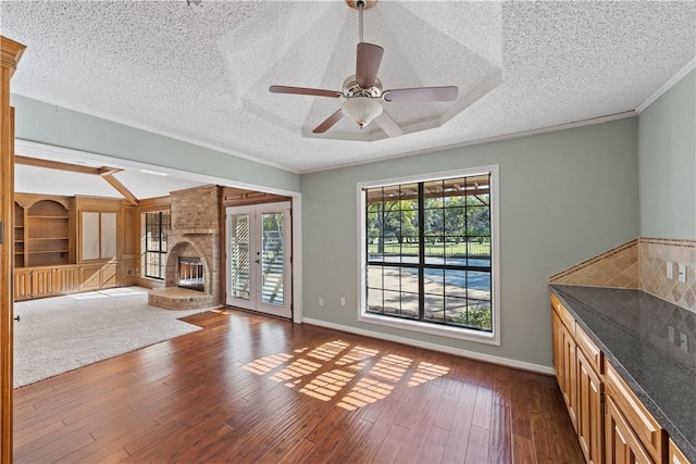 living room featuring a textured ceiling and dark hardwood / wood-style flooring