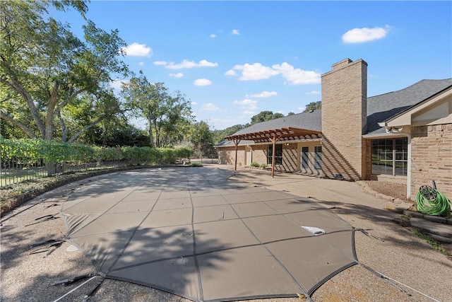 view of pool featuring a patio area