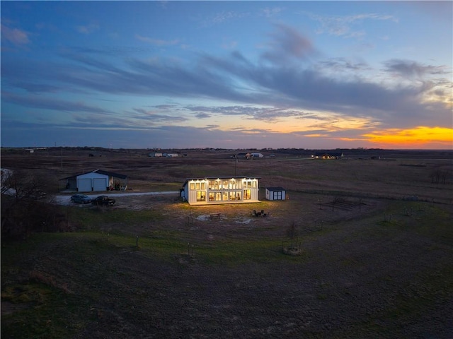 exterior space with a rural view