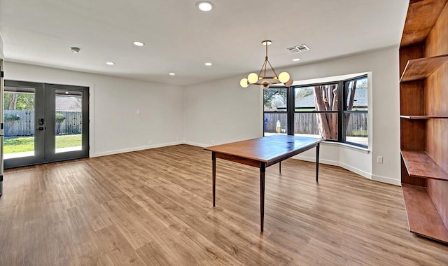 rec room with recessed lighting, visible vents, plenty of natural light, and light wood finished floors