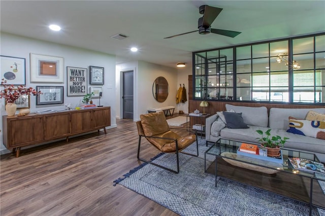 living room featuring visible vents, recessed lighting, ceiling fan, and wood finished floors