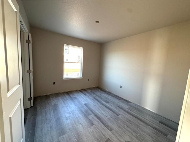 unfurnished bedroom featuring wood-type flooring