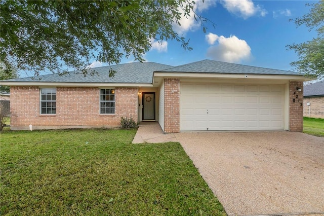 ranch-style house with a garage and a front lawn