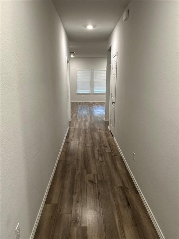 hallway featuring dark hardwood / wood-style floors