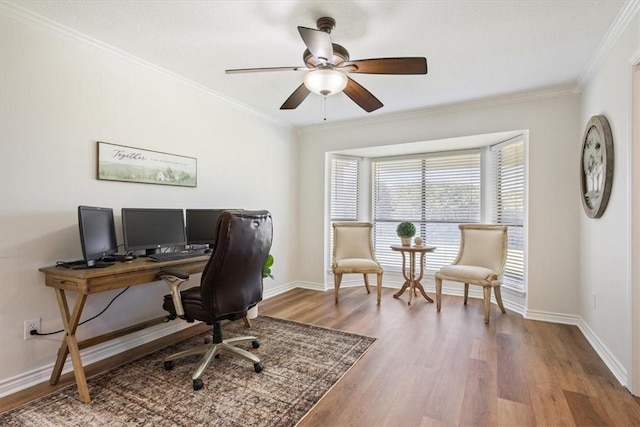 office with ceiling fan, wood-type flooring, and ornamental molding