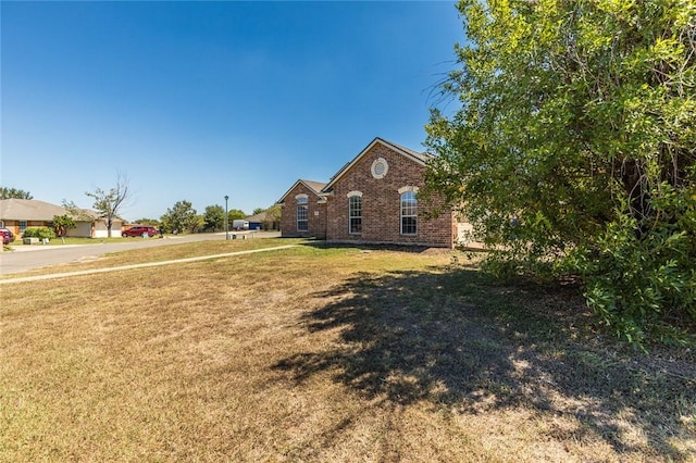 exterior space with a front yard