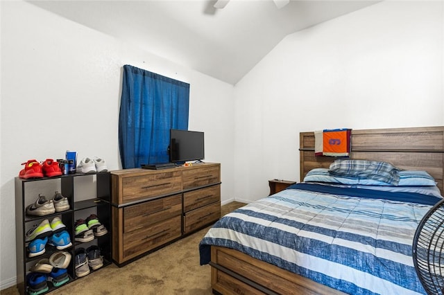 bedroom with carpet floors, vaulted ceiling, and ceiling fan