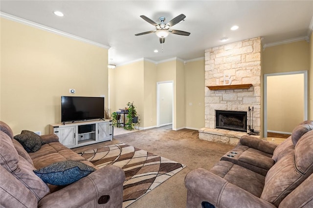 living room featuring a stone fireplace, light carpet, ceiling fan, and ornamental molding