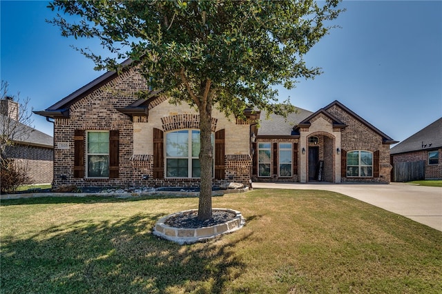 view of front of home with a front yard