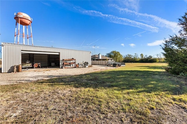 view of yard with an outdoor structure