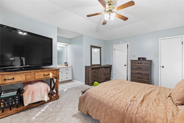 bedroom featuring ceiling fan and light colored carpet