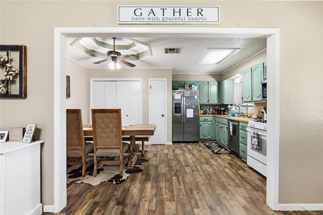 kitchen with stainless steel refrigerator with ice dispenser, ceiling fan, dark wood-type flooring, white stove, and black dishwasher