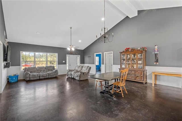 dining room with ceiling fan, beam ceiling, and high vaulted ceiling