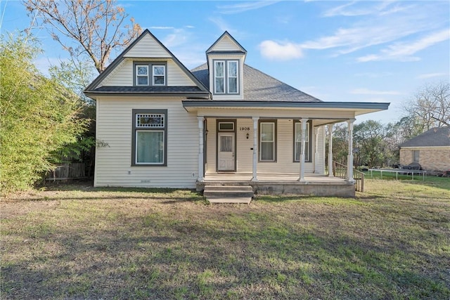 view of front of home with a porch and a front lawn