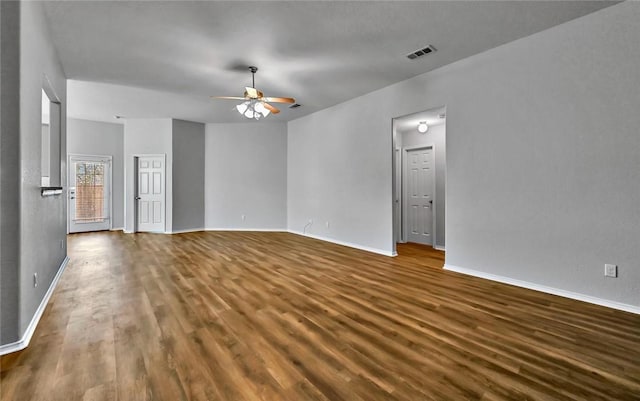 empty room featuring hardwood / wood-style floors and ceiling fan