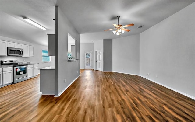 kitchen featuring ceiling fan, white cabinets, hardwood / wood-style flooring, and appliances with stainless steel finishes