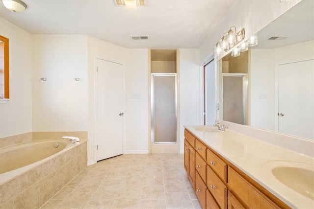 bathroom with shower with separate bathtub and vanity