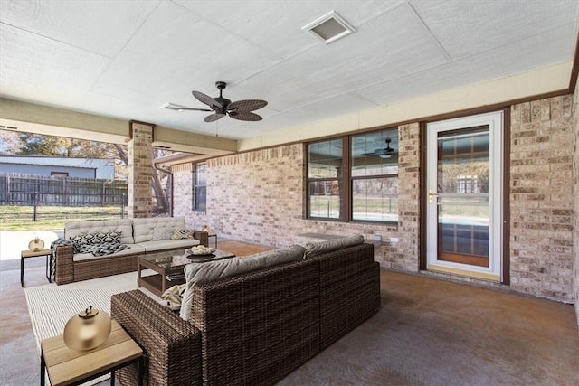 view of patio featuring ceiling fan and an outdoor living space