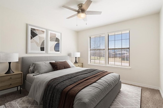 bedroom with light colored carpet and ceiling fan